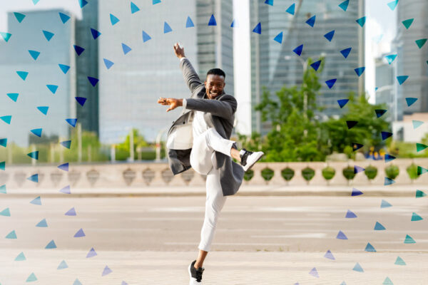 man jumping up for joy